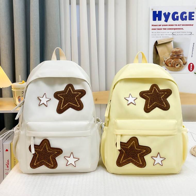 Les deux sacs Biddéew, crème et jaune, avec patchs étoiles